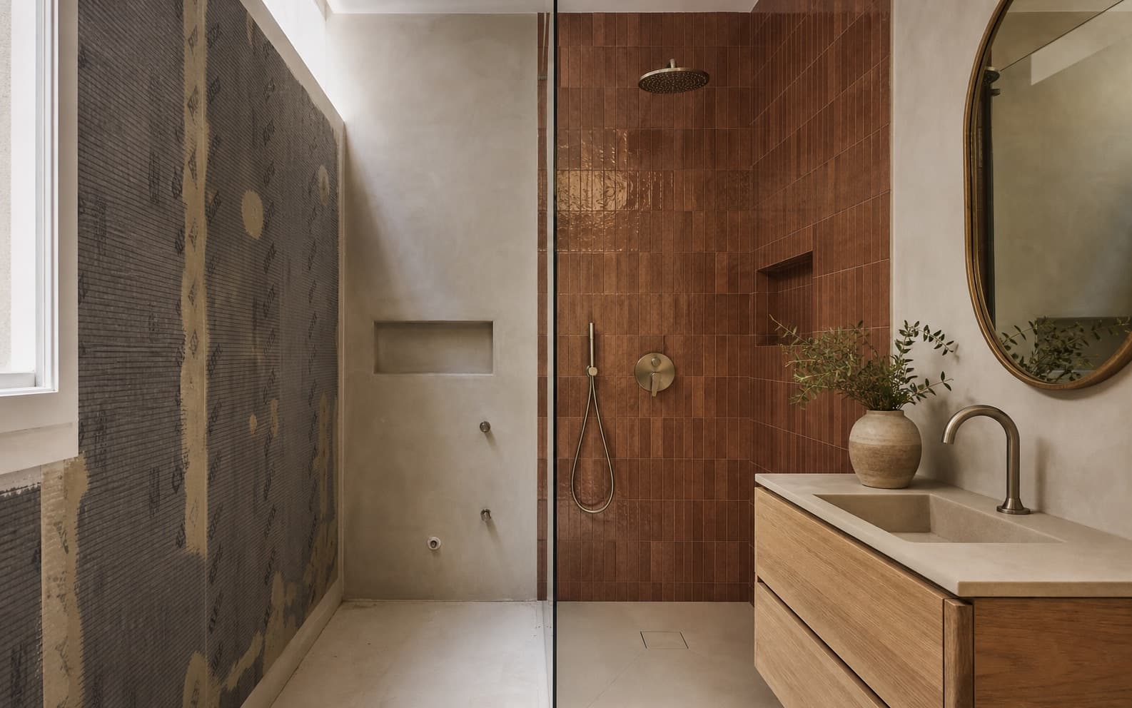 Baño en proceso de reforma con azulejo terracota e impermeabilización visible